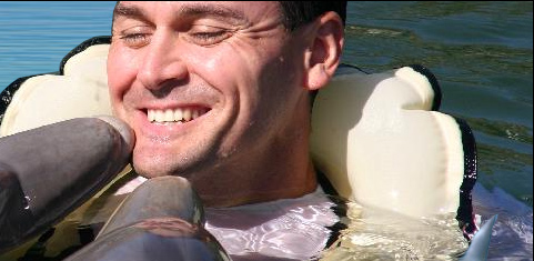 Man with dolphin.